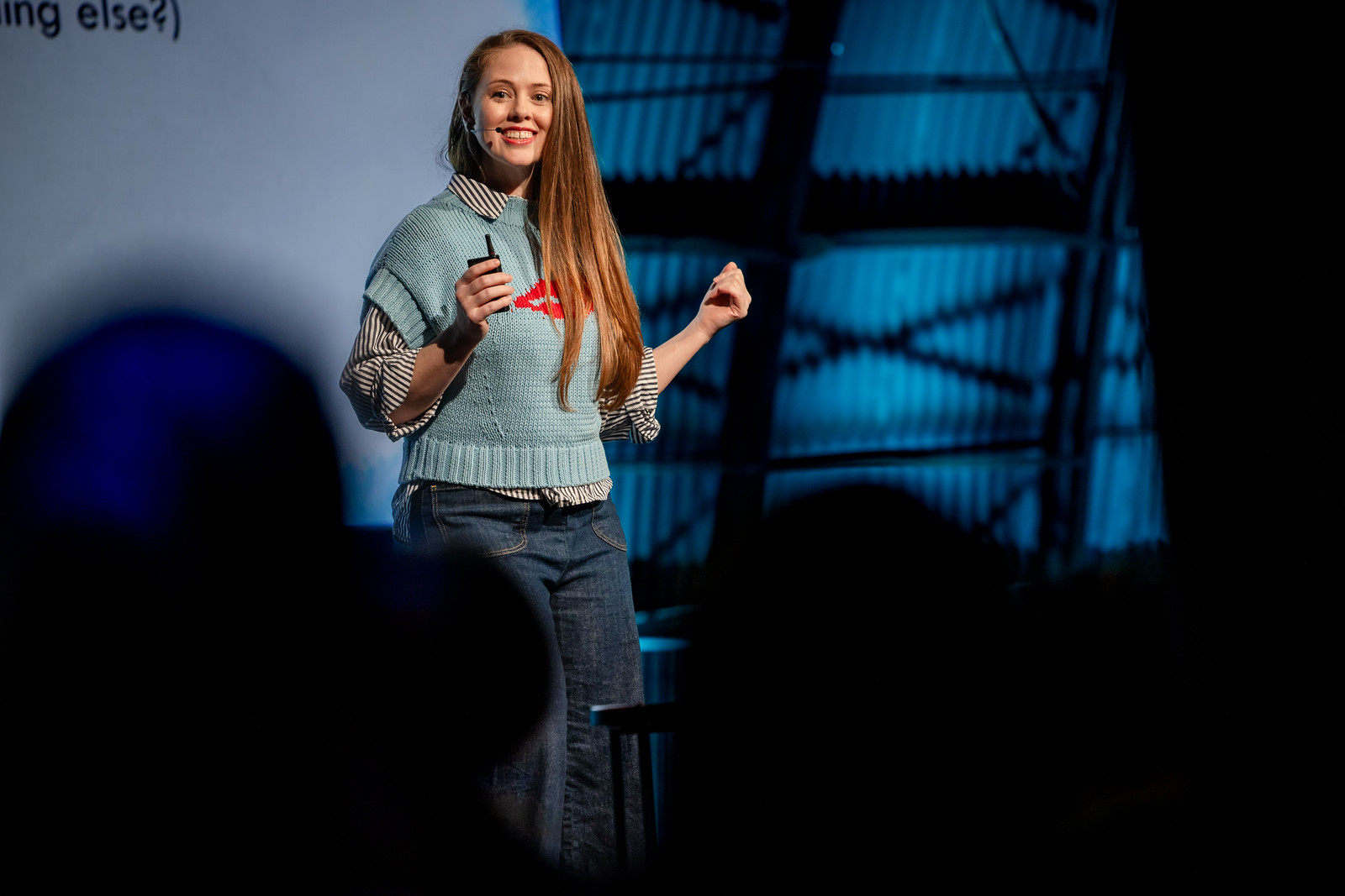 Jessica McCabe, creator of How to ADHD, smiling at the audience during her talk on the NeuroDiversion 2026 main stage